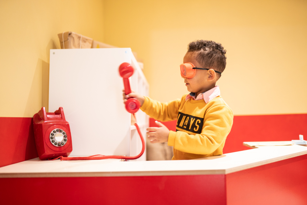 red phone and boy at bear town in exeter